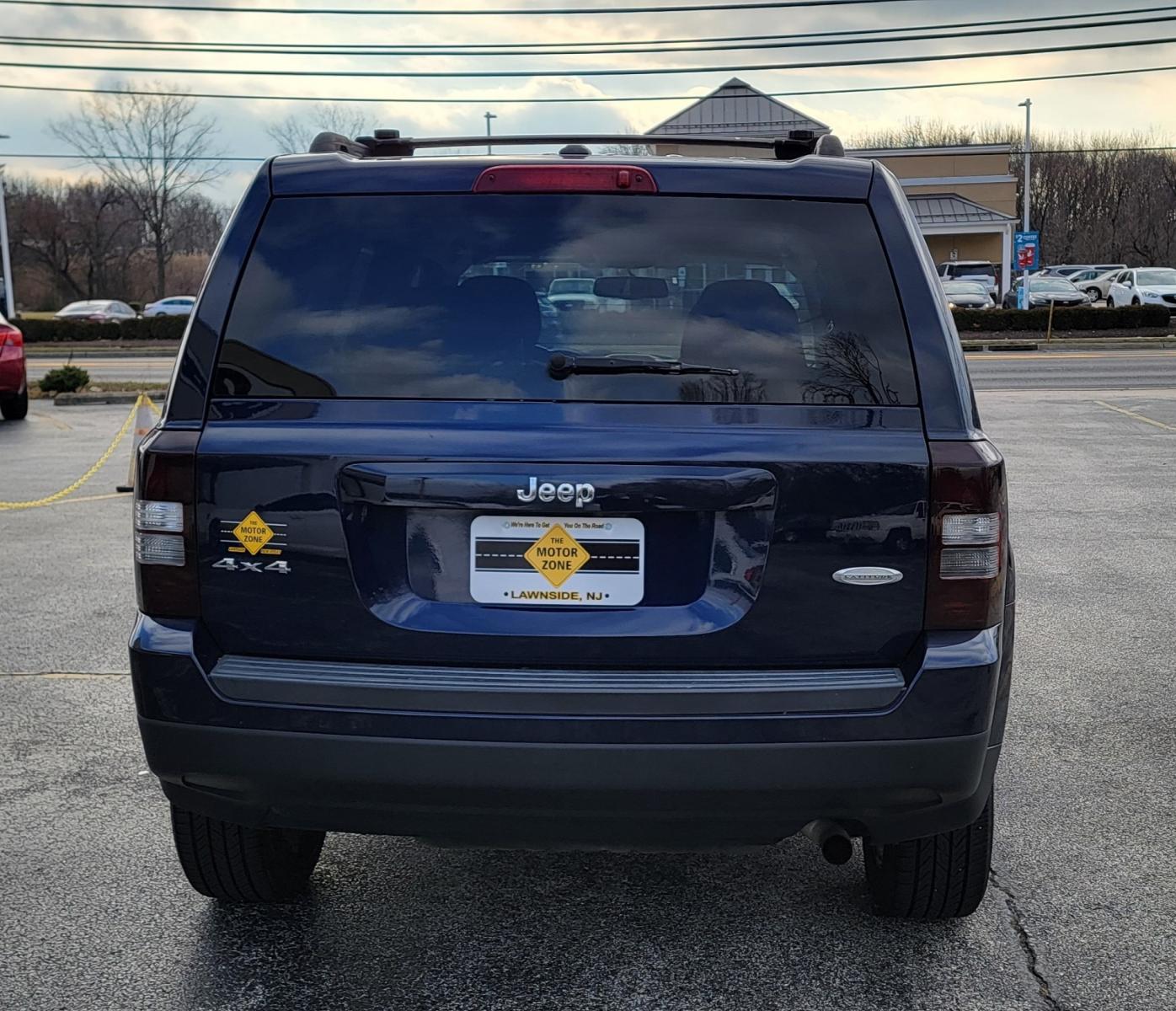 2015 Blue /Black Jeep Patriot Latitude (1C4NJRFB0FD) with an 4-Cyl, 2.4 Liter engine, Automatic transmission, located at 341 N White Horse Pike, Lawnside, NJ, 08045, (856) 262-9500, 39.855621, -75.027451 - Photo #6